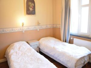 Postel nebo postele na pokoji v ubytování Villa in Vielsalm with Lake Views and Pool + 32 fotografií