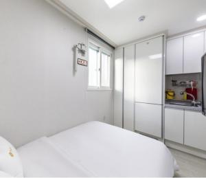 Voodi või voodid majutusasutuse JS Hostel toas