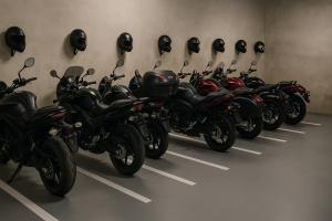 a row of motorcycles parked in a parking lot at Sova tourist B&B in Ždiar