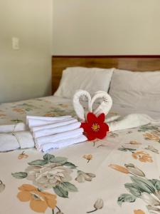 Cama ou camas em um quarto em Pousada Paraíso dos Milagres