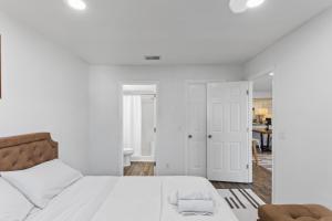 Ένα ή περισσότερα κρεβάτια σε δωμάτιο στο Secure Haven with Top Amenities +16 φωτογραφίες