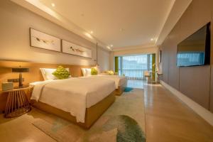 Starway Hotel Luogang Wanda Plaza房間的床