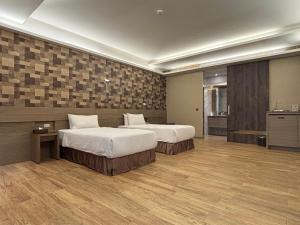 Postel nebo postele na pokoji v ubytování Romantic Code Art Motel