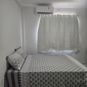 Postel nebo postele na pokoji v ubytování Quarto para dois com ar-condicionado