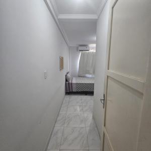 Postel nebo postele na pokoji v ubytování Quarto para dois com ar-condicionado