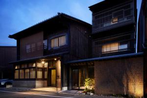 a large house with a brick building at Minn Nijo-jo in Kyoto