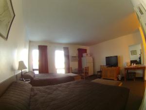 TV a/nebo společenská místnost v ubytování Rycroft Hotel