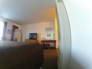 TV a/nebo společenská místnost v ubytování Rycroft Hotel
