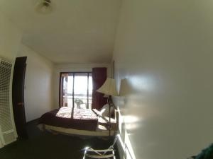 Postel nebo postele na pokoji v ubytování Rycroft Hotel
