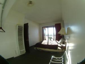 Postel nebo postele na pokoji v ubytování Rycroft Hotel