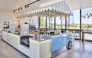 Restaurace v ubytování Omni PGA Frisco Resort by Suiteness