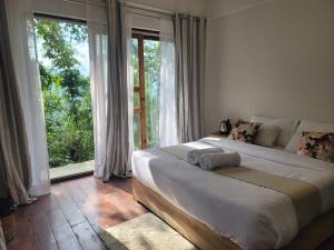 Postel nebo postele na pokoji v ubytování Miknaon Farmstay