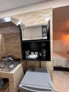 Kuchyň nebo kuchyňský kout v ubytování Oasis Urbano San Benito