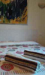 Voodi või voodid majutusasutuse Cadorna Chalet toas