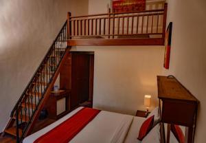 Postel nebo postele na pokoji v ubytování Puri Dibia Hotel by Secoms