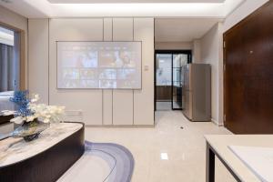 O bucătărie sau chicinetă la Shenzhen Gangxiahui Executive Apartment Futian Convention and Exhibition Center Branch