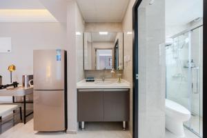 O baie la Shenzhen Gangxiahui Executive Apartment Futian Convention and Exhibition Center Branch