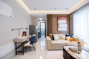 O zonă de relaxare la Shenzhen Gangxiahui Executive Apartment Futian Convention and Exhibition Center Branch