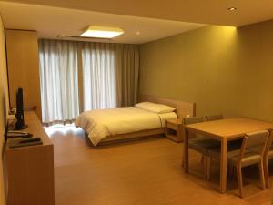 TV a/nebo společenská místnost v ubytování Kumho Jeju Resort