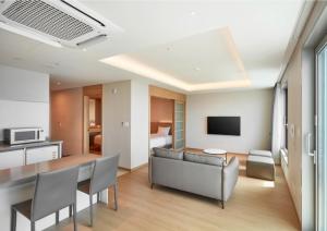 TV a/nebo společenská místnost v ubytování Kumho Jeju Resort