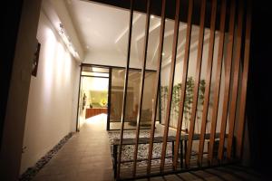 Rúm í herbergi á Bai Ji Yi B&B