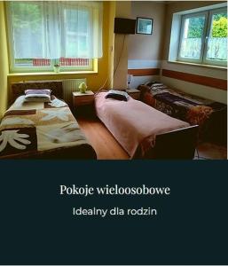Postel nebo postele na pokoji v ubytování Dom Spokoju - pokoje gościnne, pobyty grupowe