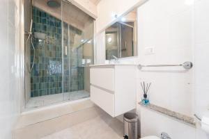 Koupelna v ubytování La Nassa + 27 fotografií