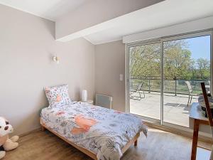 Katil atau katil-katil dalam bilik di La terrasse du Canal, appartement pour 5 personnes