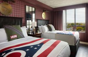 Cama ou camas em um quarto em Graduate by Hilton Columbus