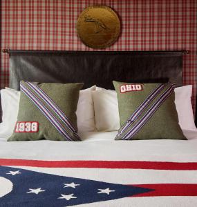 Cama ou camas em um quarto em Graduate by Hilton Columbus