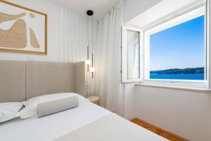 Posteľ alebo postele v izbe v ubytovaní Villa Magnolia