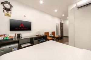 TV a/nebo společenská místnost v ubytování A25 Hotel - 19 Chả Cá + 12 fotografií