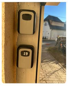 a close up of a door with the number on it at Apartament Ultracentral in Rădăuţi
