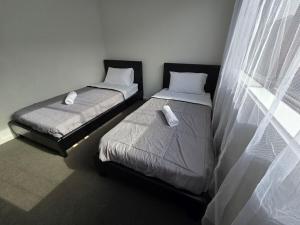 Postel nebo postele na pokoji v ubytování Serenity Home 7 by Hiverooms