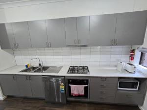 Kuchyň nebo kuchyňský kout v ubytování Serenity Home 7 by Hiverooms