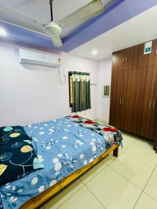 Postel nebo postele na pokoji v ubytování Sri padha vallabha serenity homestay