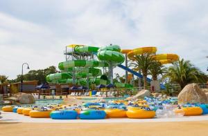a large water park with a water slide at Serenity Home 11 by Hiverooms in Pakenham