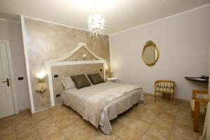 A bed or beds in a room at Torretta d'Assisi