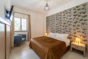 Postel nebo postele na pokoji v ubytování RESIDENCE ARCHIMEDE + 37 fotografií