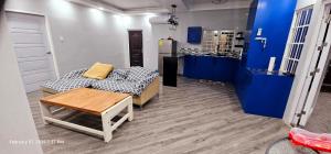 a room with a bed and a table in it at Diamonds Exclusive Resort in Diamond
