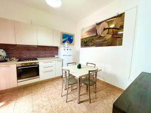 Kuchyň nebo kuchyňský kout v ubytování Casa Orchidea - Torre San Giovanni