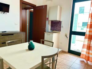 Kuchyň nebo kuchyňský kout v ubytování Casa Orchidea - Torre San Giovanni