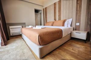 Postel nebo postele na pokoji v ubytování Vila Casablanca - Boutique Hotel & Restaurant