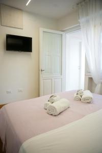 Postel nebo postele na pokoji v ubytování LHE Sole di Primavera