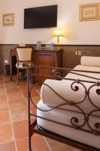 TV a/nebo společenská místnost v ubytování SarAnd Relais-Adults Only