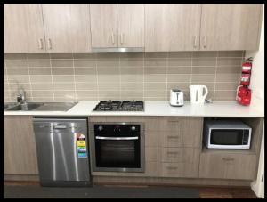 Kuchyň nebo kuchyňský kout v ubytování Serenity Home 7 by Hiverooms