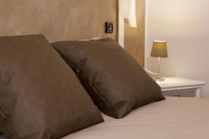 A bed or beds in a room at Torretta d'Assisi