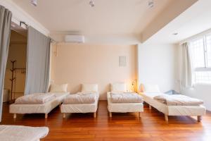 Postelja oz. postelje v sobi nastanitve Maybe Homestay