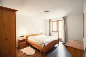 Postel nebo postele na pokoji v ubytování Residence Bergblick