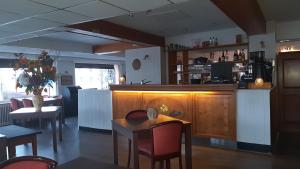 Lounge nebo bar v ubytování Hotel De La Route Verte